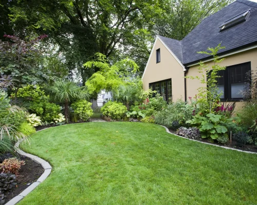 lush-garden-with-home-and-green-grass-lawn-2026-03-25-07-47-58-utc